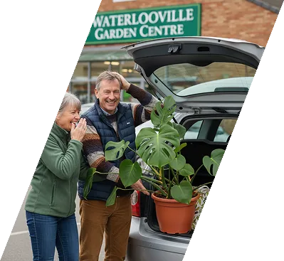 Couple at garden centre with car boot open